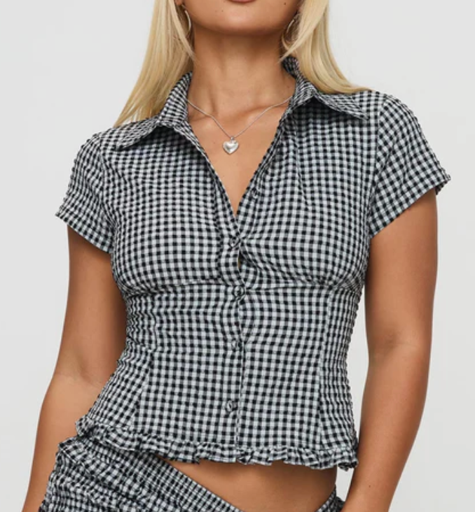 A silky, loose-fitting top for effortless everyday elegance.