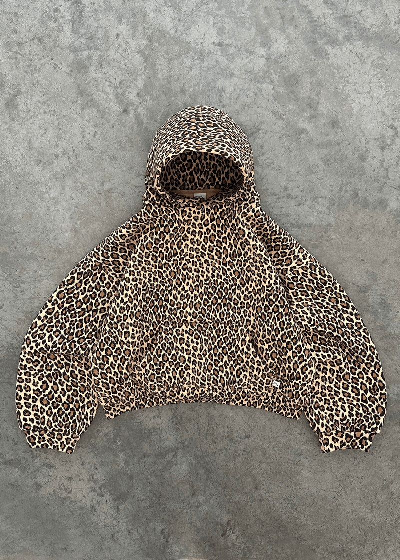 Cozy hoodie with cheetah print for casual everyday wear.