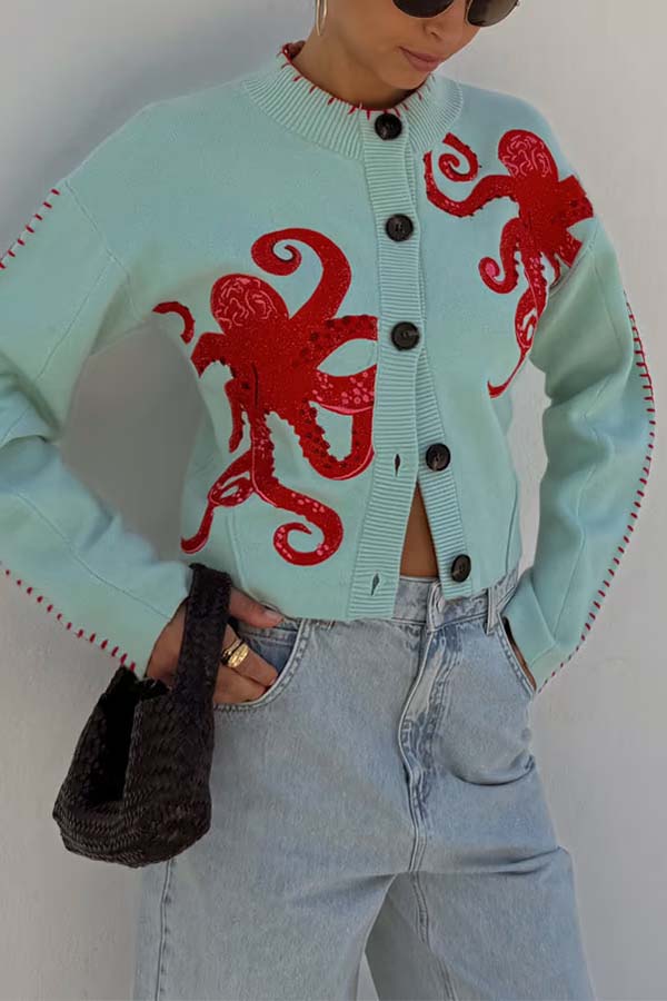 Cozy coastal cardigan with octopus motif and contrasting piping