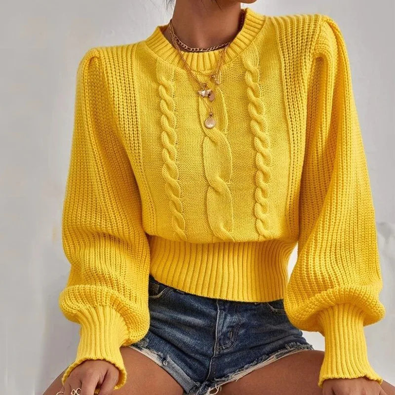 Cozy soft knit sweater with a stylish chain detail