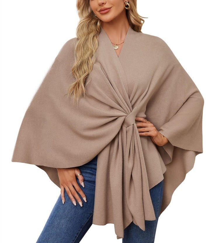 Soft, elegant shawl poncho for cozy-chic layering.