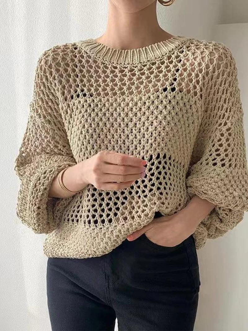 Lightweight open-knit sweater for layering.