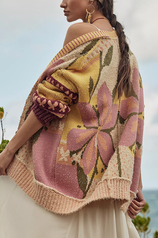 Cozy floral cardigan with a relaxed fit and long sleeves