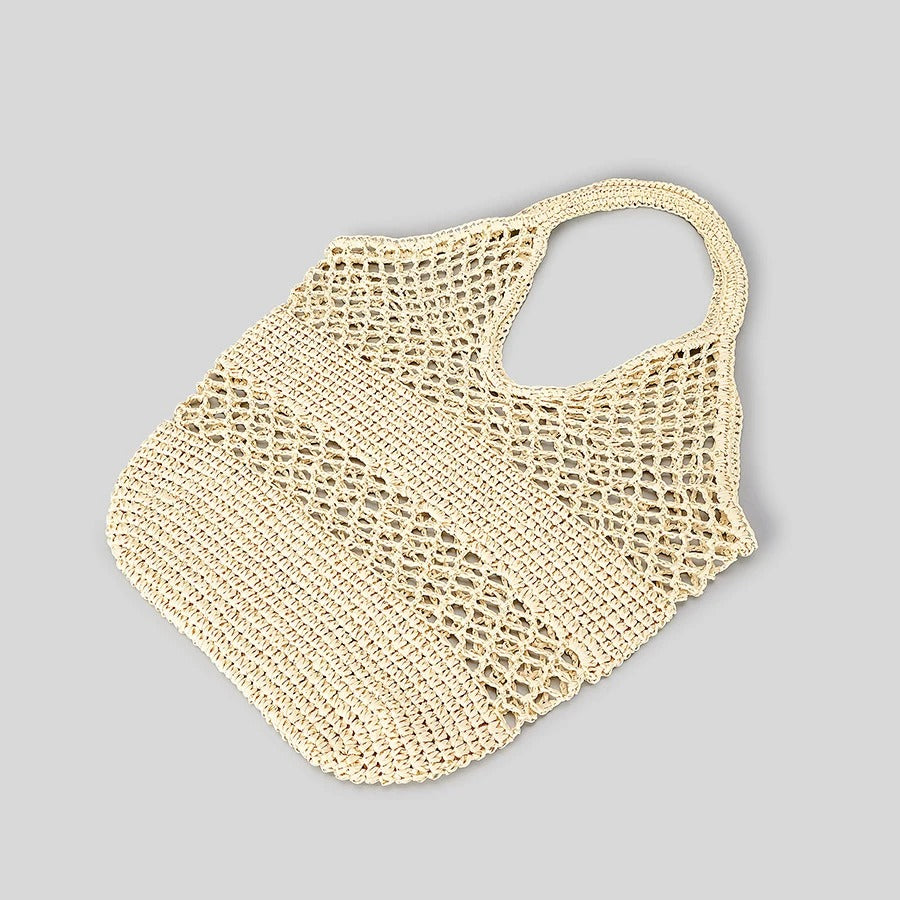 Carmen | Handmade straw bag with perforated pattern