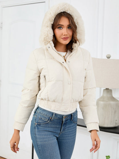 Cozy padded winter jacket with fur hood and pockets 