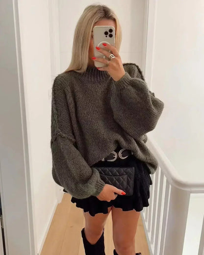 Cozy knitted turtleneck sweater with voluminous statement sleeves 