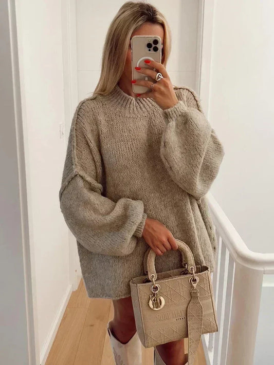 Cozy knitted turtleneck sweater with voluminous statement sleeves 