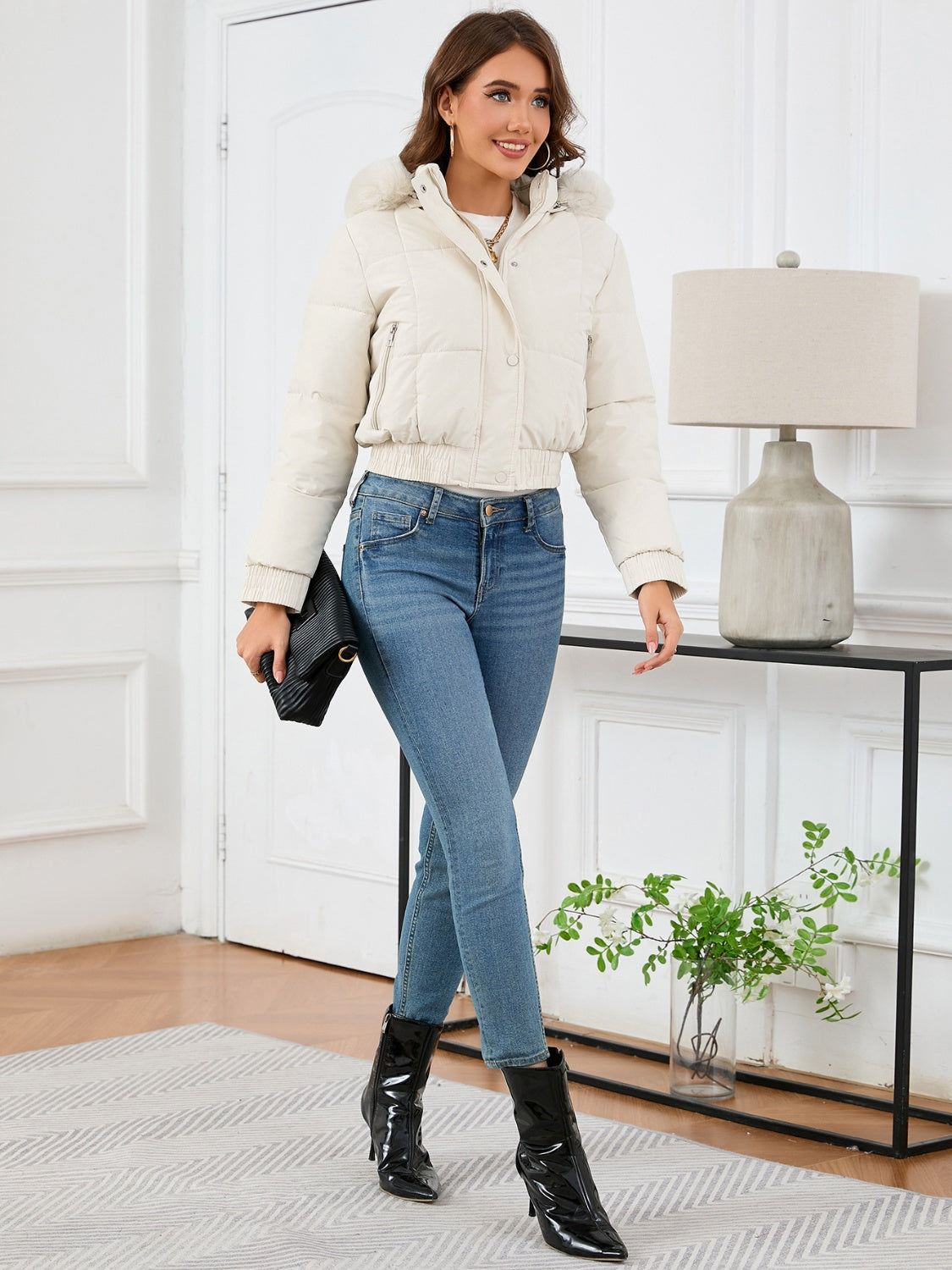 Cozy padded winter jacket with fur hood and pockets 