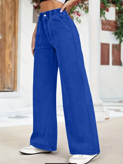 High-waisted denim cargo trousers with wide legs and oversized pockets 