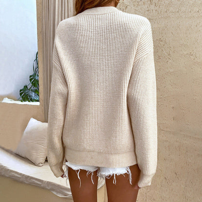 Cozy knit sweater with a stylish button collar 