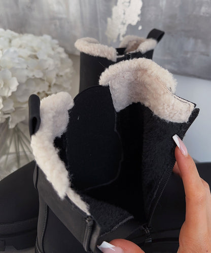 Stylish black leather ankle boots 