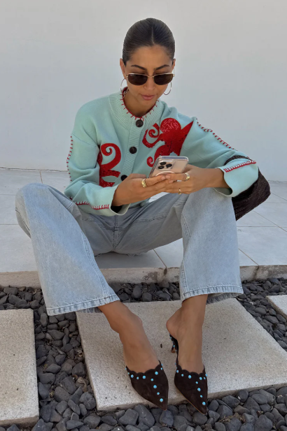 Cozy coastal cardigan with octopus motif and contrasting piping 