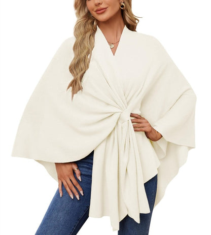 Soft, elegant shawl poncho for cozy-chic layering. 
