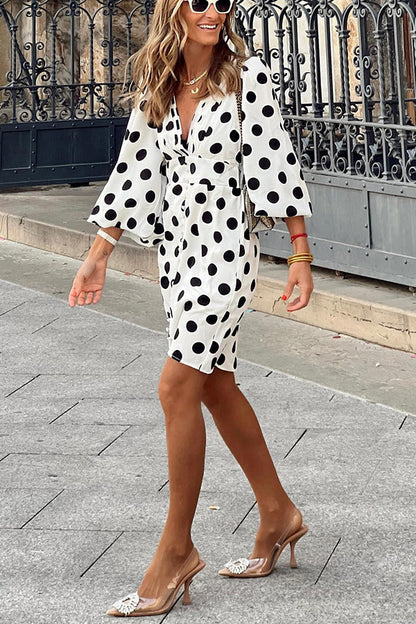 Mini dress with puff sleeves and polka dot buttons 