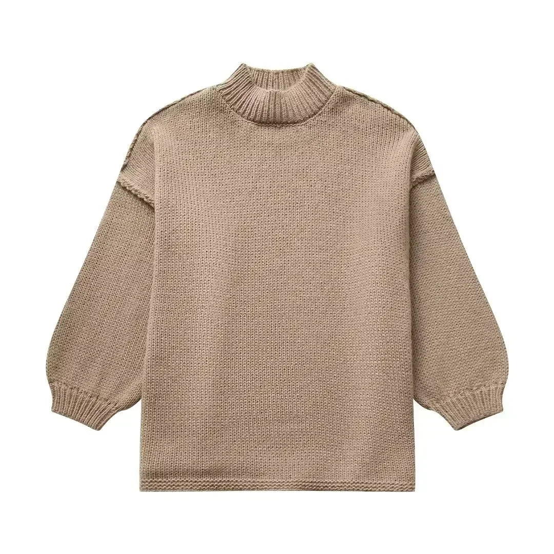 Cozy knitted turtleneck sweater with voluminous statement sleeves 