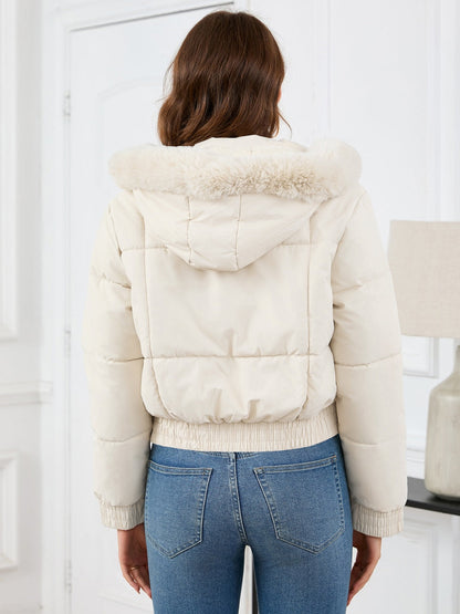 Cozy padded winter jacket with fur hood and pockets 