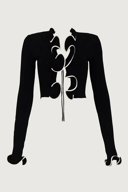 Cozy cardigan with ruffles and knot detail at the front 