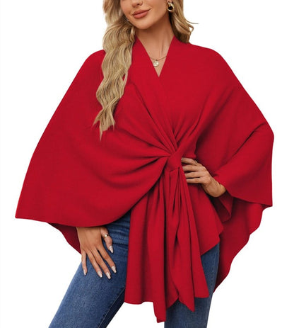 Soft, elegant shawl poncho for cozy-chic layering. 