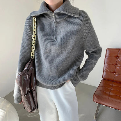 Cozy thick knit sweater with zip collar for autumn layering. 