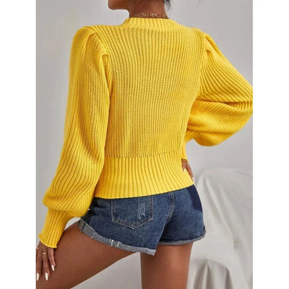 Cozy soft knit sweater with a stylish chain detail 