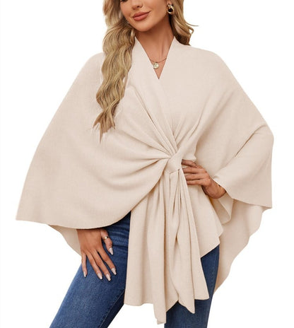 Soft, elegant shawl poncho for cozy-chic layering. 