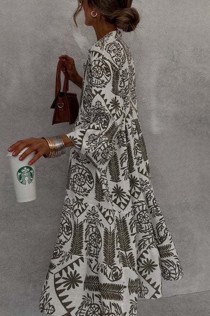 Printed mini dress with V-neck and bell sleeves 