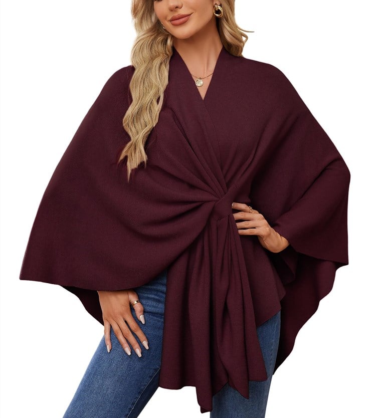 Soft, elegant shawl poncho for cozy-chic layering. 