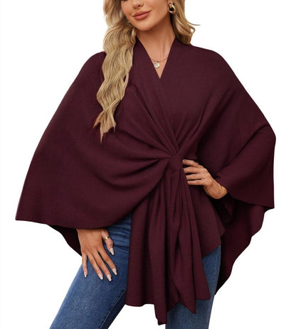 Soft, elegant shawl poncho for cozy-chic layering. 