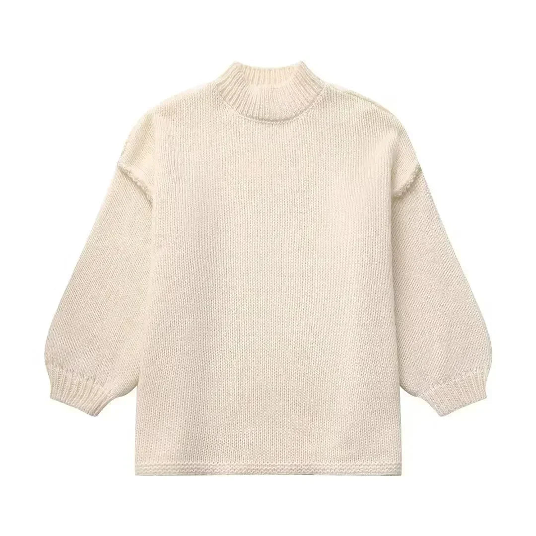 Cozy knitted turtleneck sweater with voluminous statement sleeves 