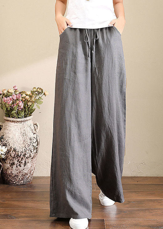Trousers in French grey linen with wide legs, elasticated waistband and pockets 