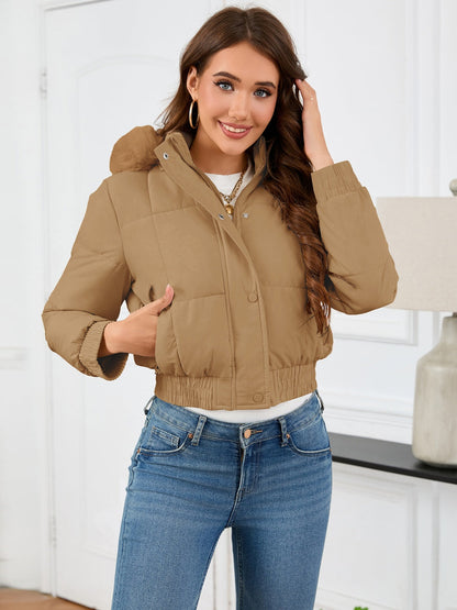 Cozy padded winter jacket with fur hood and pockets 