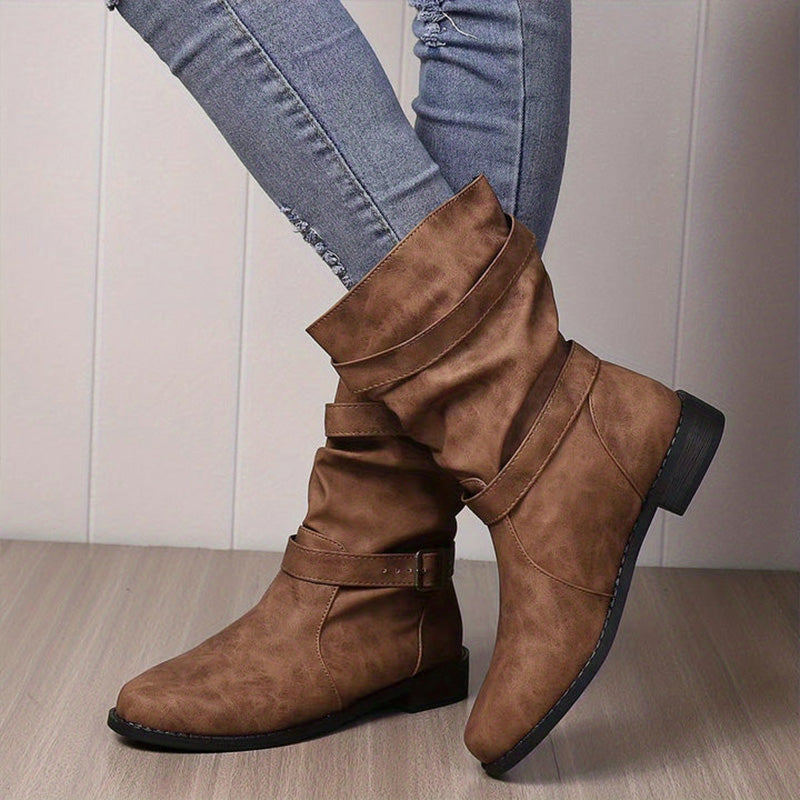 Stylish leather boots with buckle detail 