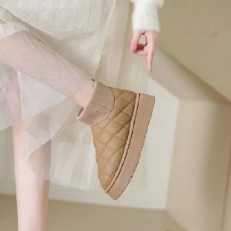 Cozy knitted sock booties with a thick sole and warm lining 