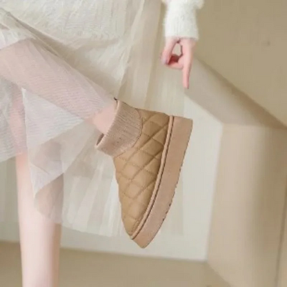 Cozy knitted sock booties with a thick sole and warm lining 