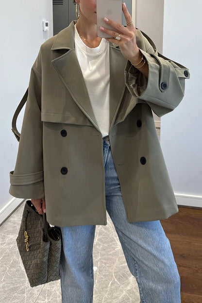 Fashionable urban trench coat with belt, lapels and button details 