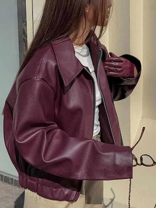 Bordeaux red faux leather jacket with stylish lapel collar and zipper details 