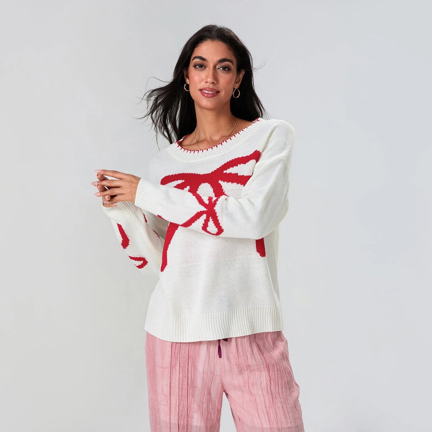 Frieda | Festive knitted sweater with bow design