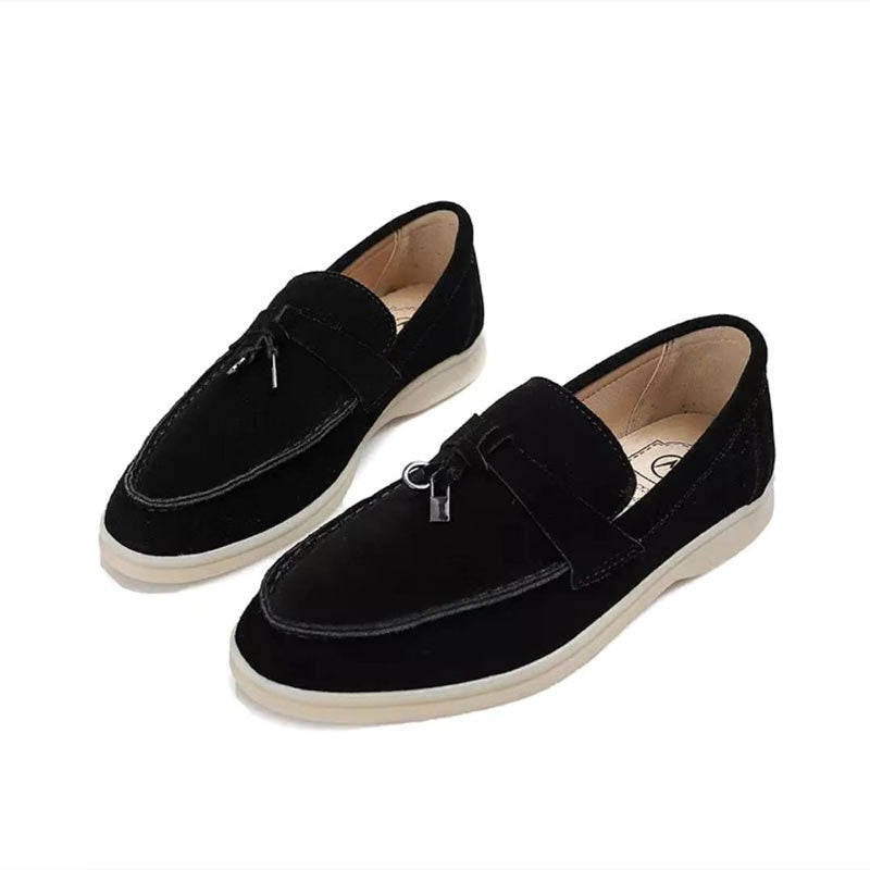 Women's leather loafers with a chic buckle detail 