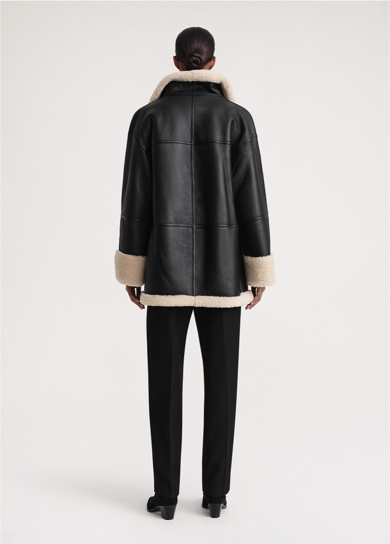 Cozy winter coat made of faux fur 