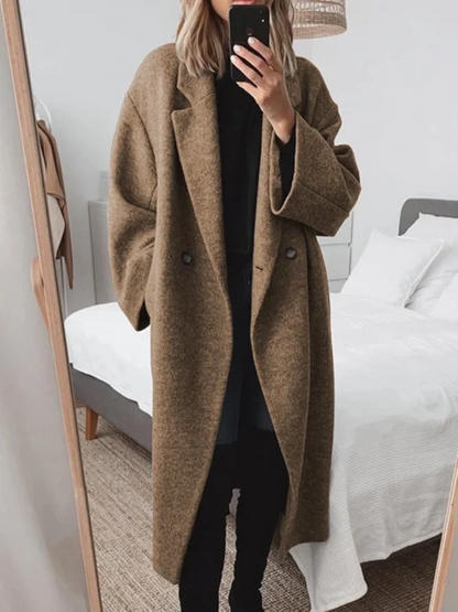 Elegant long, loose-fitting coat with double button placket 