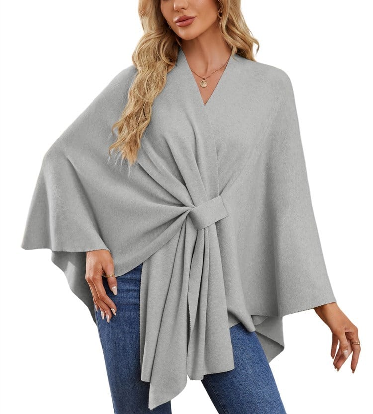 Soft, elegant shawl poncho for cozy-chic layering. 