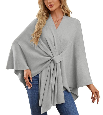 Soft, elegant shawl poncho for cozy-chic layering. 