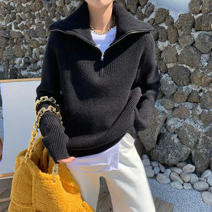 Cozy thick knit sweater with zip collar for autumn layering. 