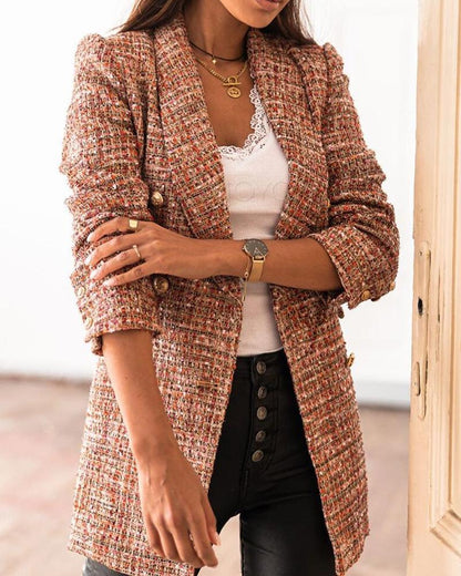 Elegant long checked tweed blazer for chic layered looks. 