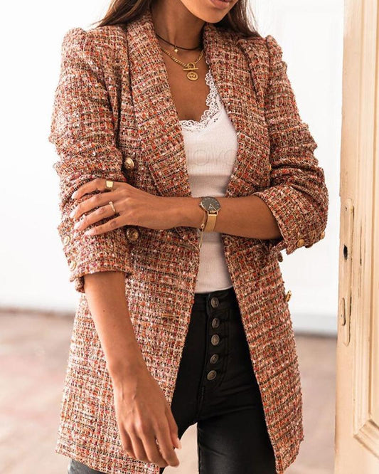 Elegant long checked tweed blazer for chic layered looks. 