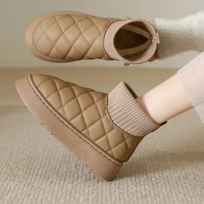 Cozy knitted sock booties with a thick sole and warm lining 