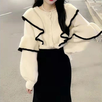 Reign™ - Soft, sticky sweater