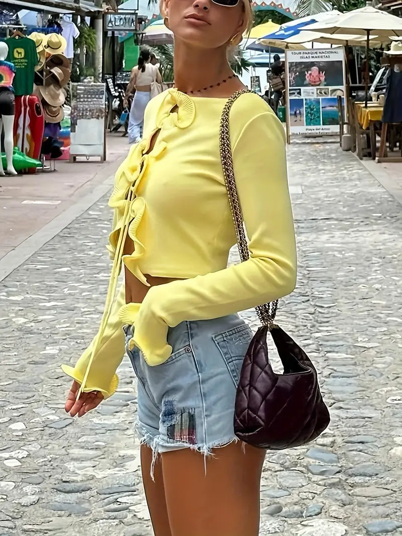 Cozy cardigan with ruffles and knot detail at the front 