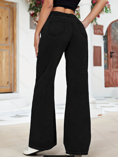 High-waisted denim cargo trousers with wide legs and oversized pockets 
