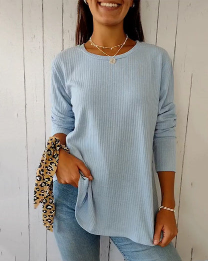 Cozy ribbed knit top with a round neckline and long sleeves 